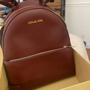 Michael Kors Burgundy and Gold Backpack (Oxblood)